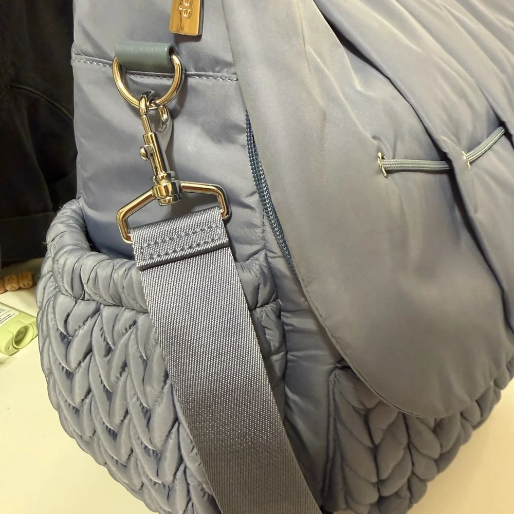 Happ brand diaper bag in a beautiful blue